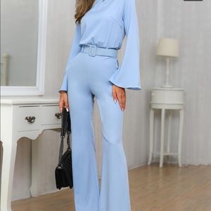 Periwinkle blue bell sleeve jumpsuit with belt